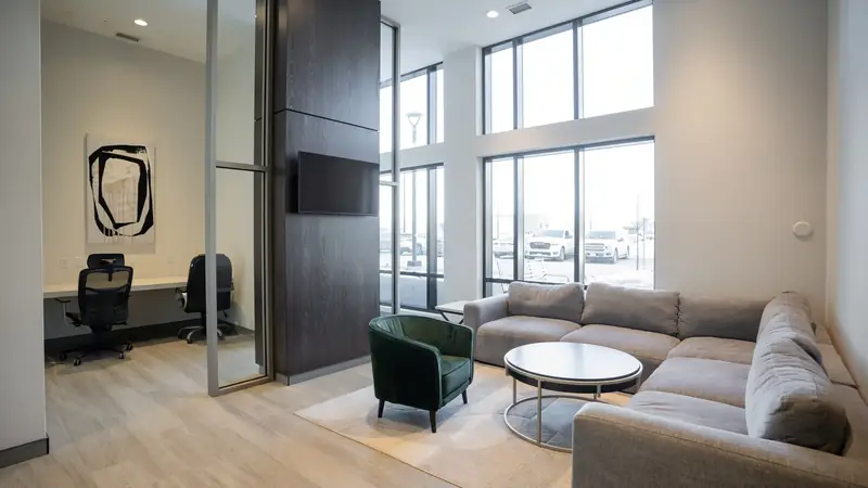 Co-working lounge with desks and seating