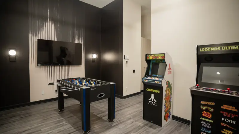 Games room with foosball and arcade machines