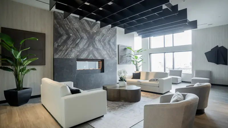 Resident lounge with fireplace and sofas